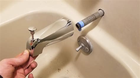 new tub spout leaking from back|How to Fix a Leaky Bathtub Faucet: 6 Ways to Stop。